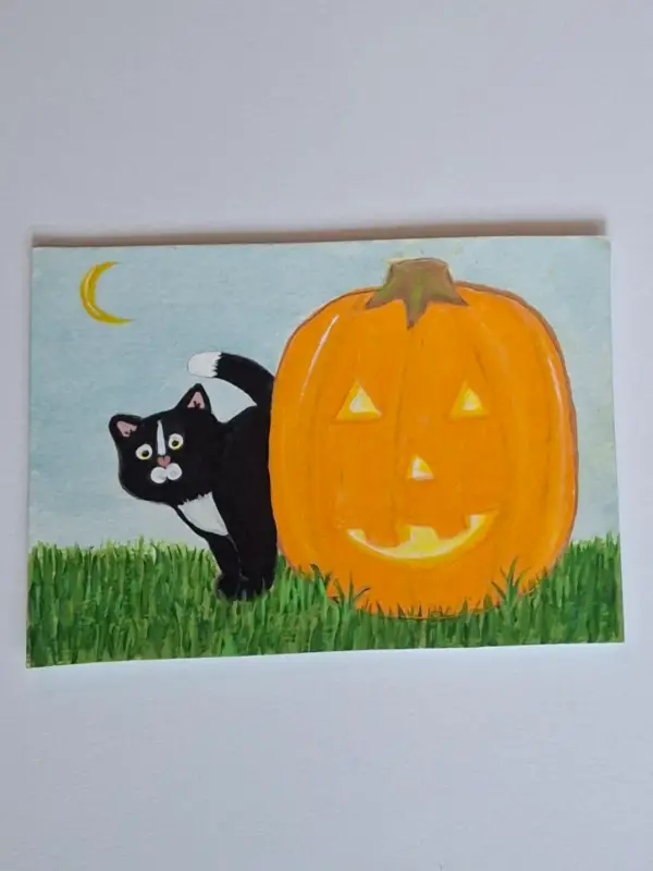 Cat peeking behind pumpkin aceo art card